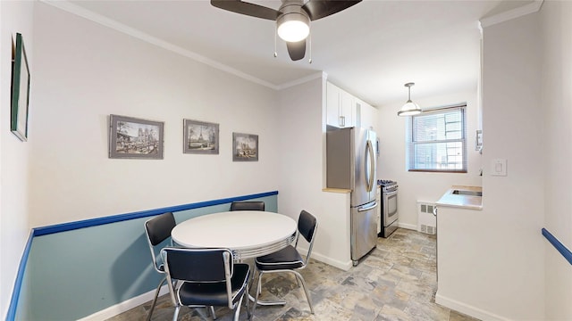 90-02 63rd Dr Unit 5J, Rego Park, NY 11374 - dining area featuring stone finish flooring, crown molding, ceiling fan, and radiator heating unit