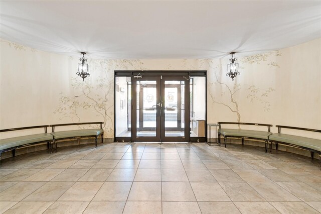 90-02 63rd Dr Unit 5J, Rego Park, NY 11374 - building lobby featuring wallpapered walls