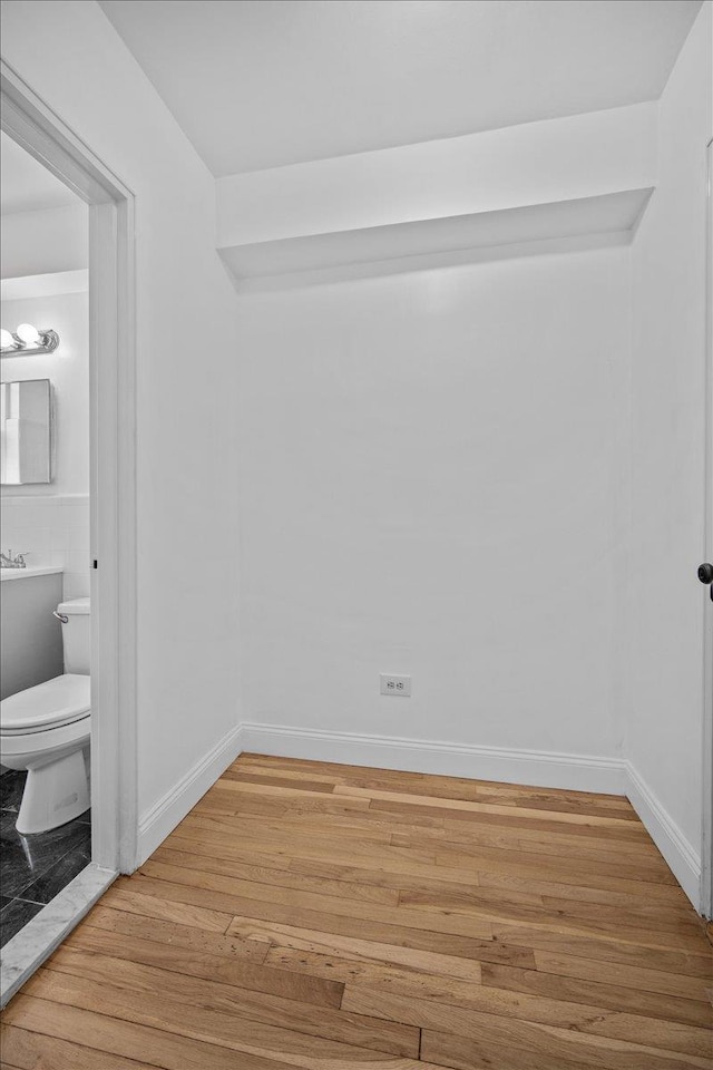 2102 Holland Ave Unit 6D, Bronx, NY 10462 - spare room featuring light wood-style flooring and baseboards