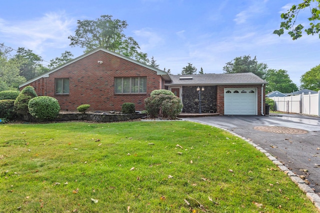 60 Wheatfield Ln, Commack, NY 11725 - view of front of property with brick siding, asphalt driveway, and an attached garage
