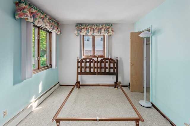 60 Wheatfield Ln, Commack, NY 11725 - bedroom with a baseboard radiator and baseboards