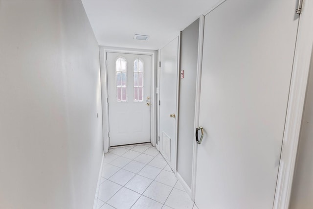 60 Wheatfield Ln, Commack, NY 11725 - entryway featuring light tile patterned flooring and baseboards