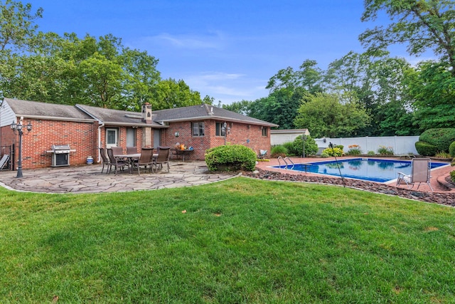 60 Wheatfield Ln, Commack, NY 11725 - view of swimming pool featuring area for grilling and a patio