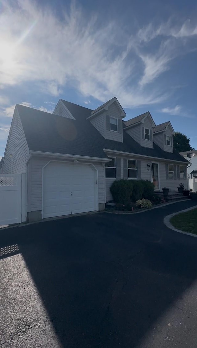 34 Harlem Ave, Medford, NY 11763 - cape cod house with a garage and driveway