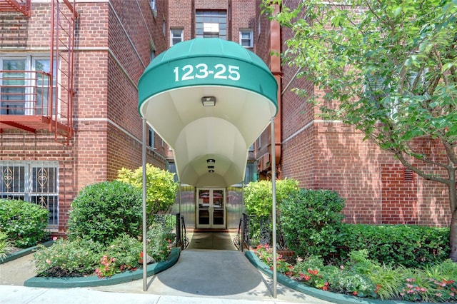 123-25 82nd Ave Unit 5R, Kew Gardens, NY 11415 - entrance to property with brick siding and french doors