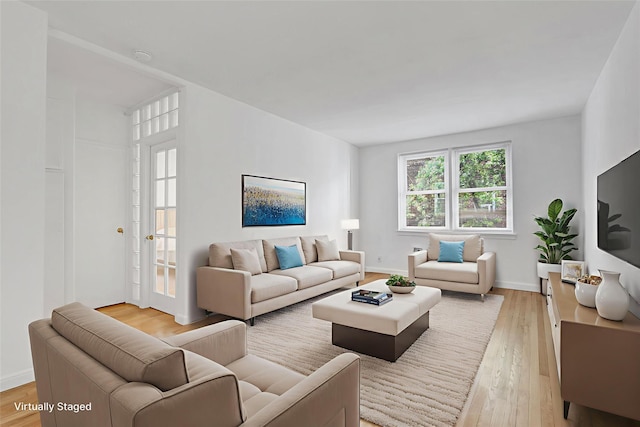 123-25 82nd Ave Unit 5R, Kew Gardens, NY 11415 - living area with light wood-style flooring and baseboards