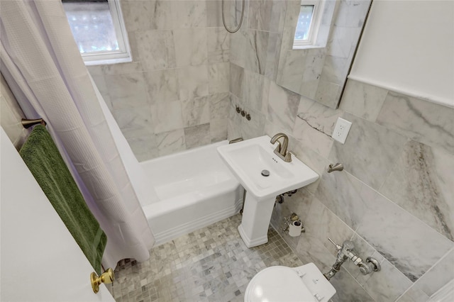 123-25 82nd Ave Unit 5R, Kew Gardens, NY 11415 - full bath with shower / bath combination with curtain, healthy amount of natural light, and tile walls
