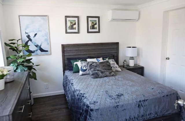 7-12 125th St, College Point, NY 11356 - bedroom with a wall mounted air conditioner, dark wood-type flooring, and crown molding