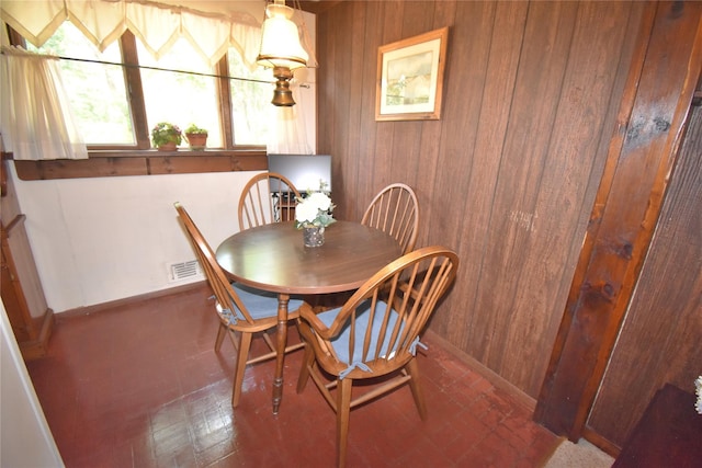 43 Circuit Rd, Bellport, NY 11713 - dining space featuring wooden walls and baseboards