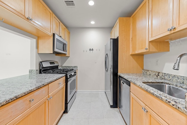 APTA2-22 Constitution Pl Unit 167, College Point, NY 11356 - kitchen with appliances with stainless steel finishes, light brown cabinets, light stone counters, and recessed lighting