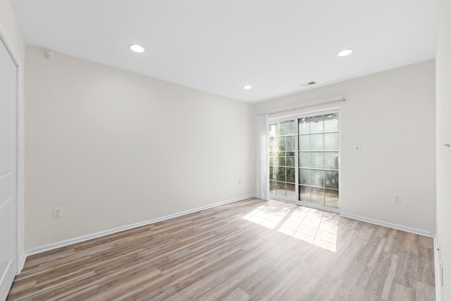 APTA2-22 Constitution Pl Unit 167, College Point, NY 11356 - empty room with light wood-style floors and recessed lighting