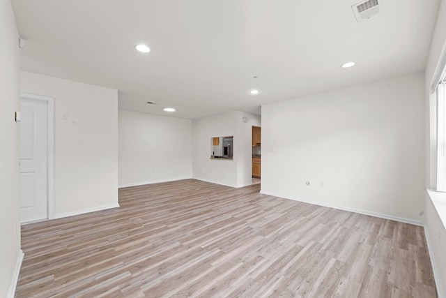 APTA2-22 Constitution Pl Unit 167, College Point, NY 11356 - empty room with light wood-style floors and recessed lighting
