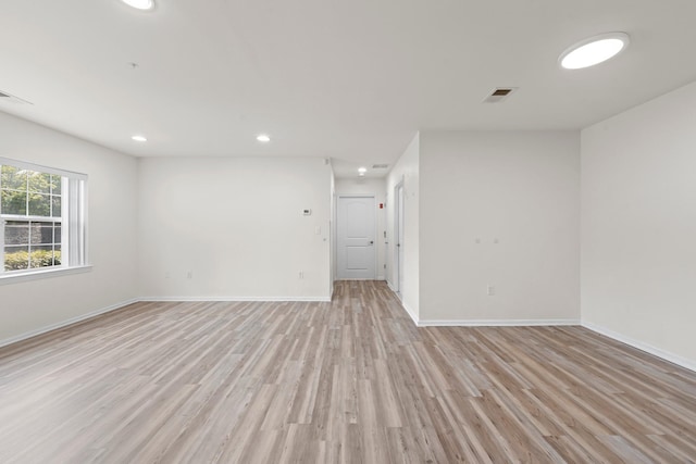 APTA2-22 Constitution Pl Unit 167, College Point, NY 11356 - empty room featuring light wood-type flooring and recessed lighting
