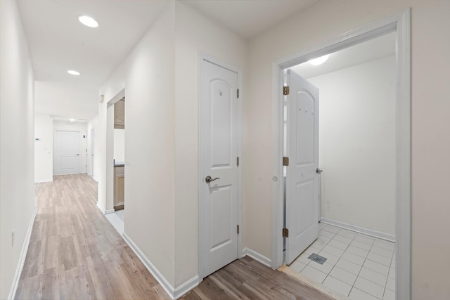 APTA2-22 Constitution Pl Unit 167, College Point, NY 11356 - hall with light wood-style flooring and recessed lighting
