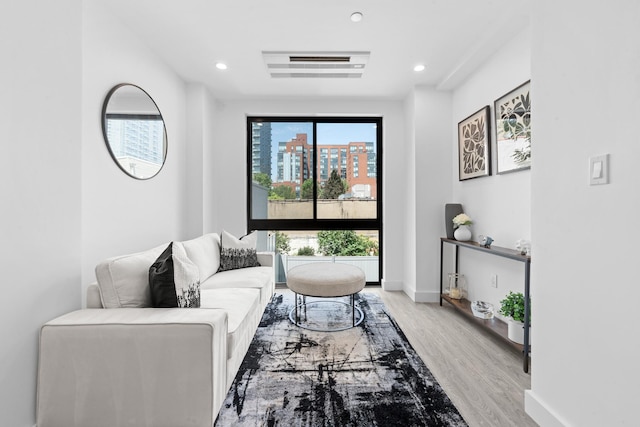 46-40 Vernon Blvd Unit 2B, Long Island City, NY 11101 - living room with healthy amount of natural light, wood finished floors, and recessed lighting