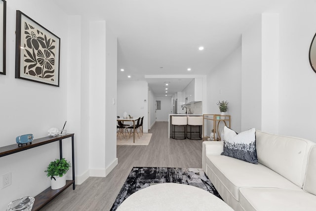 46-40 Vernon Blvd Unit 2B, Long Island City, NY 11101 - living room with light wood-style flooring and recessed lighting