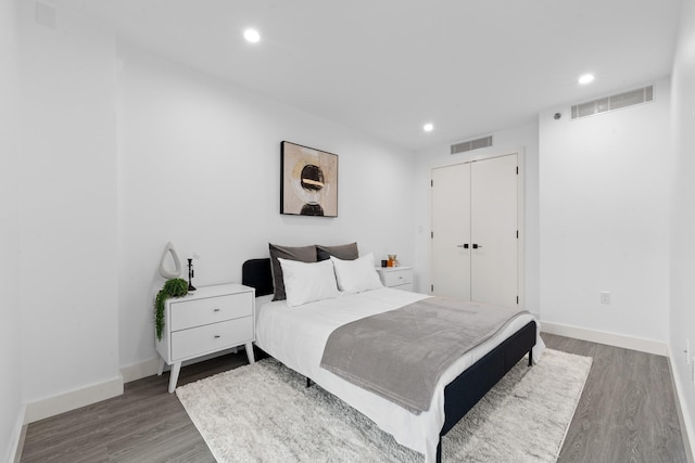 46-40 Vernon Blvd Unit 2B, Long Island City, NY 11101 - bedroom featuring wood finished floors, recessed lighting, and a closet