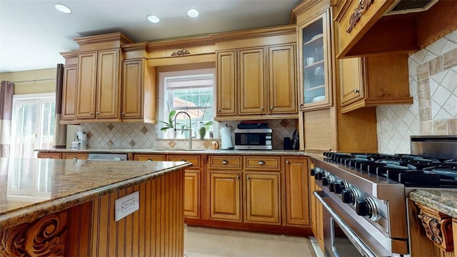 9 Roselawn Rd, Highland Mills, NY 10930 - kitchen with appliances with stainless steel finishes, premium range hood, backsplash, and light stone counters