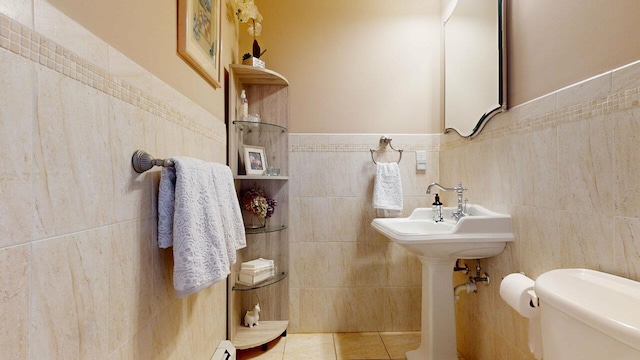 9 Roselawn Rd, Highland Mills, NY 10930 - bathroom featuring tile walls, tile patterned floors, and a wainscoted wall