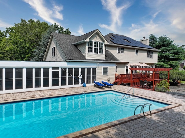 9 Roselawn Rd, Highland Mills, NY 10930 - outdoor pool with a wooden deck, a sunroom, and a patio area
