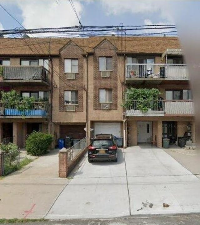 42-38 157th, Flushing, NY 11355 - view of property with driveway and an attached garage