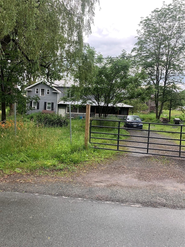 3 Burr Rd, Cochecton, NY 12726 - view of front facade with a gate and dirt driveway