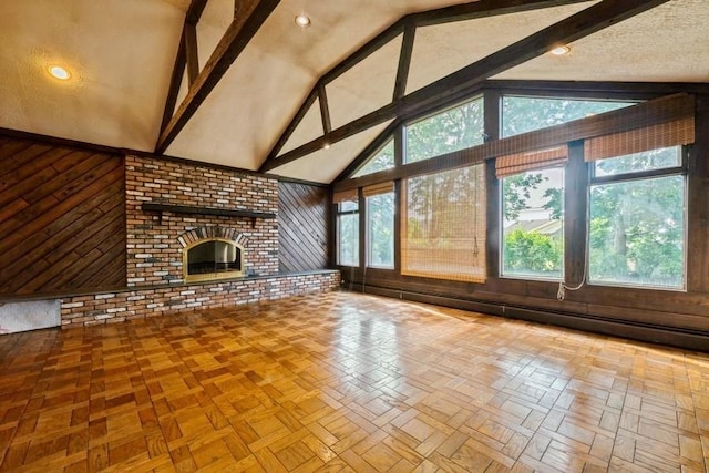709 Seabury Ave, Franklin Square, NY 11010 - unfurnished living room featuring wooden walls, beamed ceiling, a fireplace, high vaulted ceiling, and baseboard heating