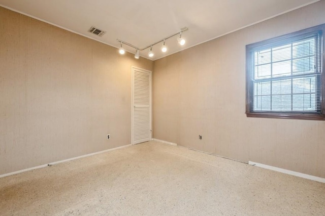 709 Seabury Ave, Franklin Square, NY 11010 - unfurnished room featuring rail lighting