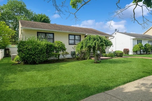 709 Seabury Ave, Franklin Square, NY 11010 - view of front facade with a front yard