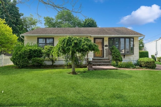 709 Seabury Ave, Franklin Square, NY 11010 - view of front of property with a front yard