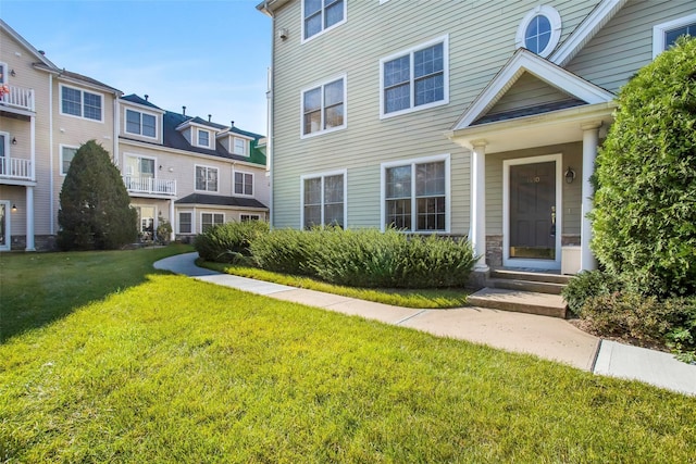 1410 Half Moon Bay Dr, Croton-On-Hudson, NY 10520 - view of exterior entry with a lawn