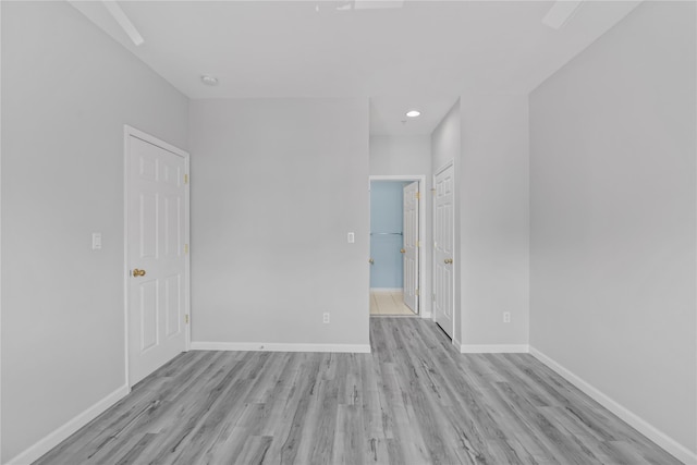 1410 Half Moon Bay Dr, Croton-On-Hudson, NY 10520 - unfurnished room with wood finished floors, recessed lighting, and a smoke detector