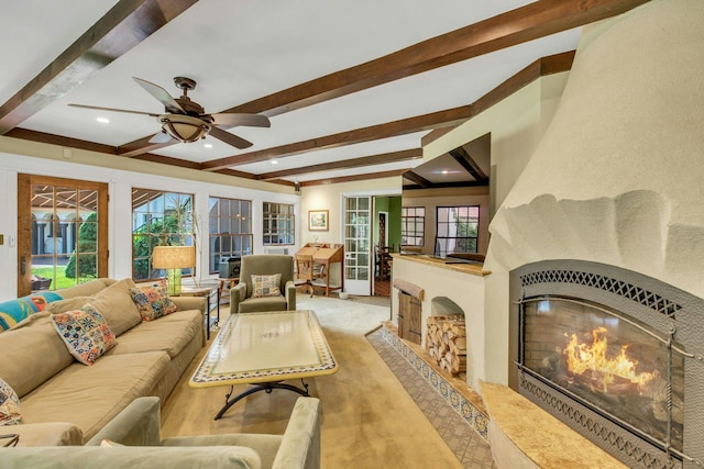 259 Lakeview Ave W, Brightwaters, NY 11718 - living area with a lit fireplace, beam ceiling, a ceiling fan, carpet floors, and recessed lighting