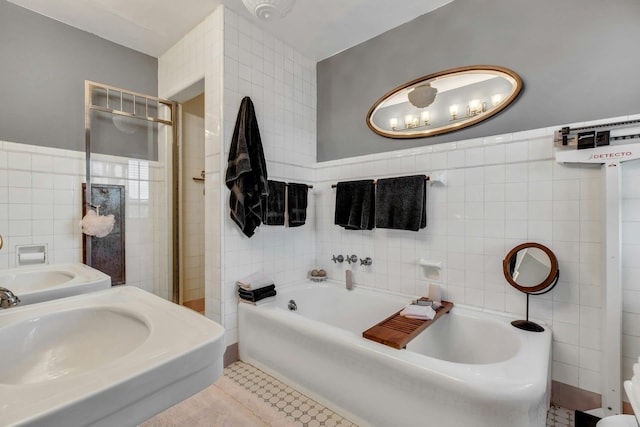 259 Lakeview Ave W, Brightwaters, NY 11718 - full bath featuring tile walls, a bath, and tile patterned flooring