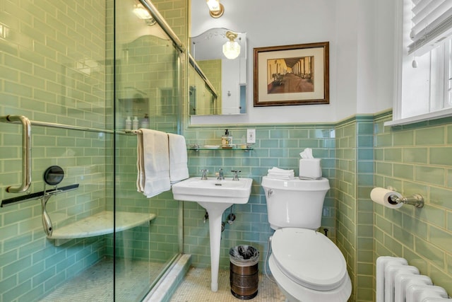 259 Lakeview Ave W, Brightwaters, NY 11718 - full bathroom featuring radiator heating unit, a shower stall, tile walls, and tile patterned flooring
