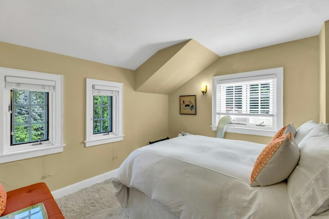259 Lakeview Ave W, Brightwaters, NY 11718 - carpeted bedroom featuring baseboards and lofted ceiling