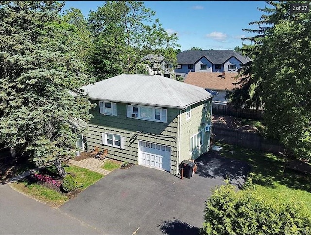 6 Schevchenko Pl, Monsey, NY 10977 - view of front of home with driveway and a garage