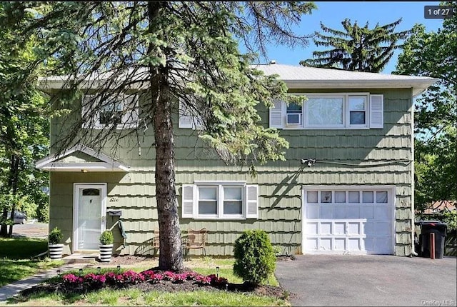 6 Schevchenko Pl, Monsey, NY 10977 - view of front of home with an attached garage and driveway