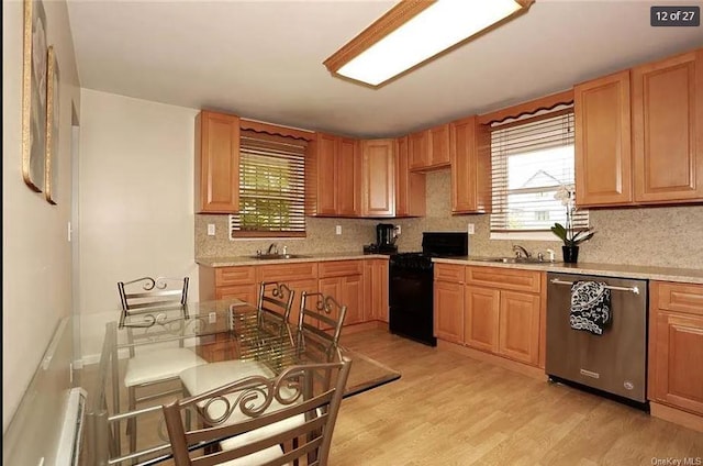 6 Schevchenko Pl, Monsey, NY 10977 - kitchen with dishwasher, black range oven, plenty of natural light, and light wood-type flooring