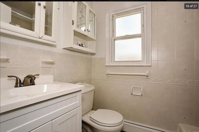 6 Schevchenko Pl, Monsey, NY 10977 - bathroom with tile walls, vanity, and a baseboard radiator