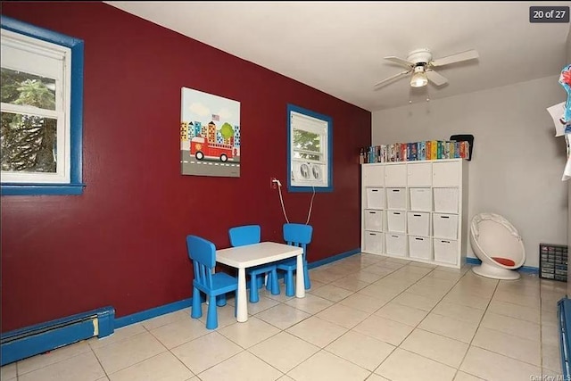 6 Schevchenko Pl, Monsey, NY 10977 - dining room featuring ceiling fan, an accent wall, and light tile patterned floors