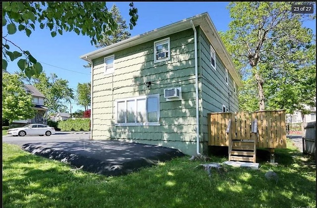 6 Schevchenko Pl, Monsey, NY 10977 - view of home's exterior with a yard and a wall mounted air conditioner
