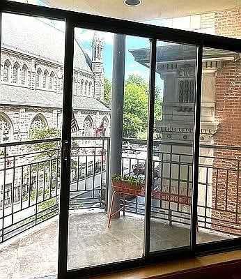 8 W 65th St Unit 5A, New York Manhattan, NY 10023 - entryway featuring wood finished floors and floor to ceiling windows