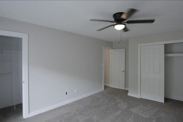 227 Springmeadow Dr Unit E, Holbrook, NY 11741 - unfurnished bedroom with carpet flooring, a spacious closet, and a ceiling fan