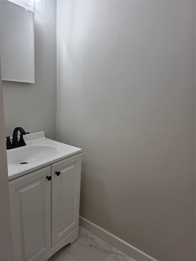 227 Springmeadow Dr Unit E, Holbrook, NY 11741 - bathroom with marble finish floors and vanity