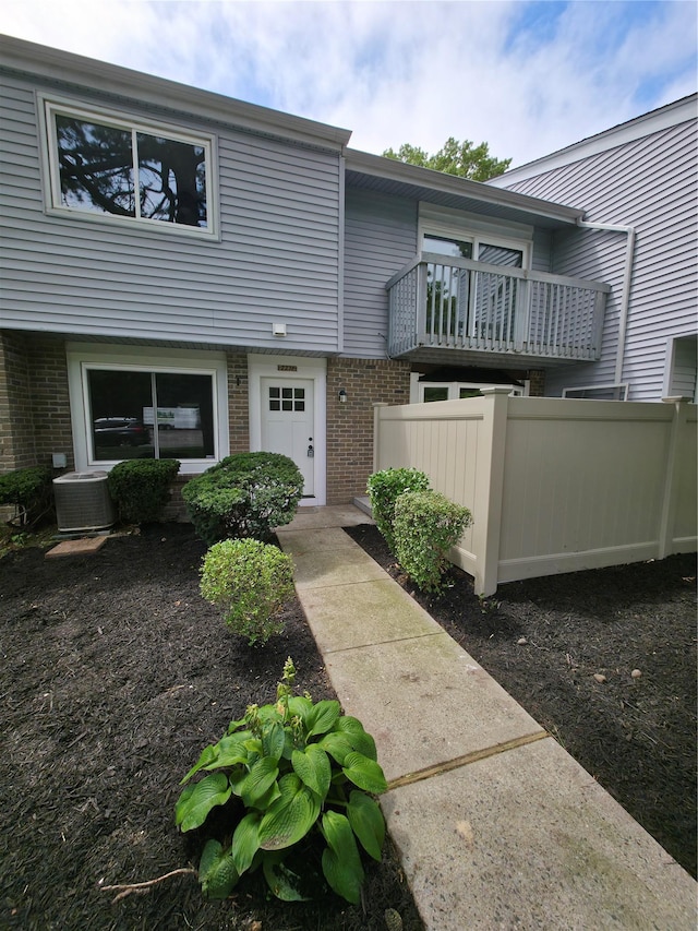 227 Springmeadow Dr Unit E, Holbrook, NY 11741 - view of front of house featuring brick siding