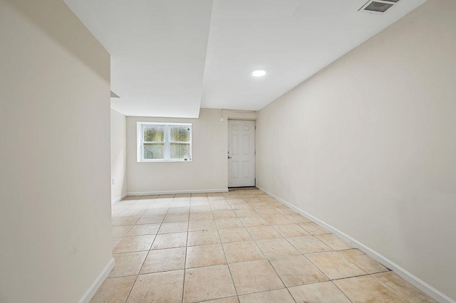 16407 Goethals Ave, Jamaica, NY 11432 - unfurnished room with light tile patterned floors and recessed lighting