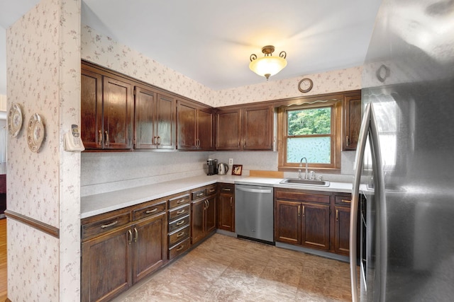 278 Fort Van Tyle Rd, Port Jervis, NY 12771 - kitchen featuring stainless steel appliances, wallpapered walls, light countertops, dark brown cabinetry, and light flooring