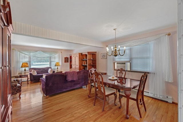 278 Fort Van Tyle Rd, Port Jervis, NY 12771 - dining area featuring a chandelier and light wood finished floors