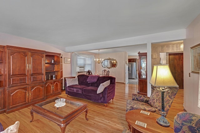 278 Fort Van Tyle Rd, Port Jervis, NY 12771 - living area with light wood-type flooring and a chandelier